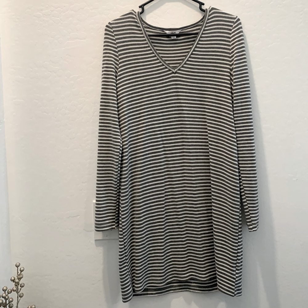 Long sleeve dress with grey and white stripes.